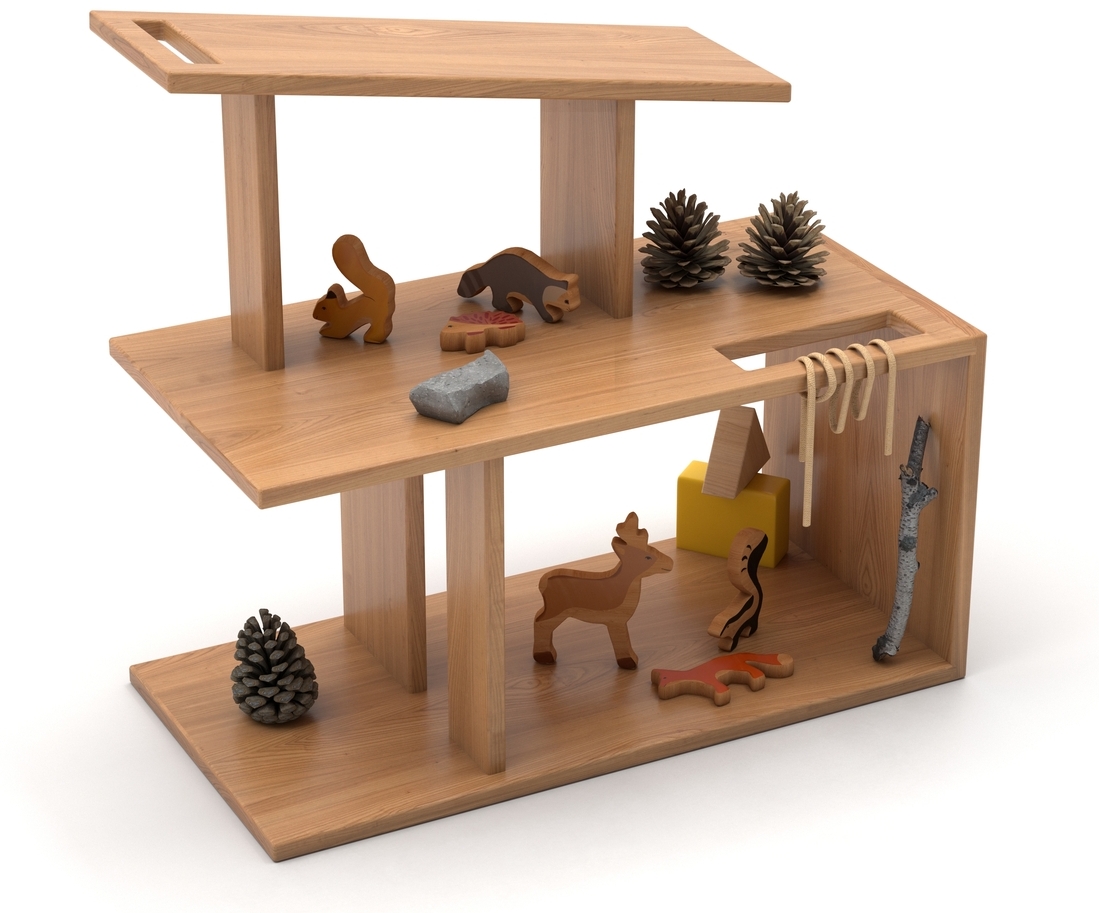 Wooden playhouse with animal figures and nature materials from the forest
